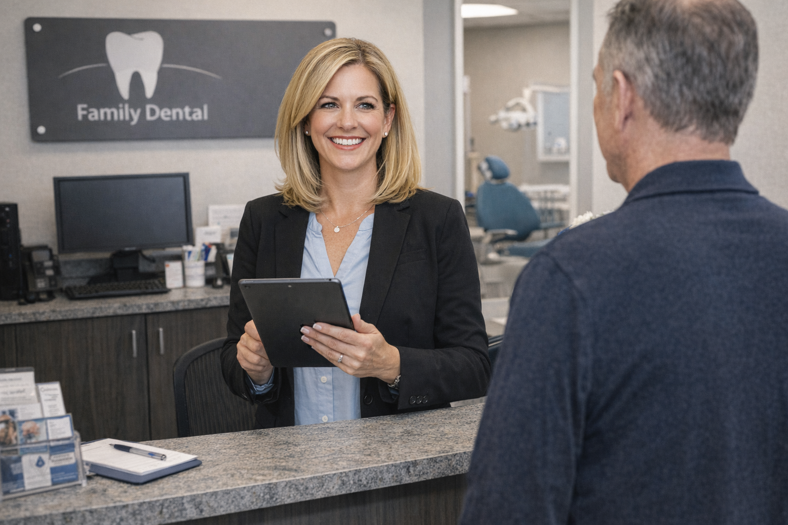 Office Manager Engaging With Patient